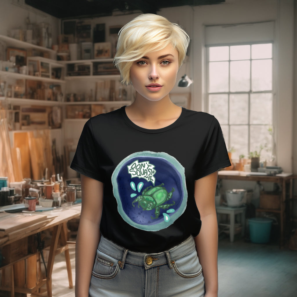 Model wearing the 'Don't Squash Me' T-Shirt in classic Black, highlighting the striking watercolor beetle design, a statement piece advocating for kindness towards all creatures.