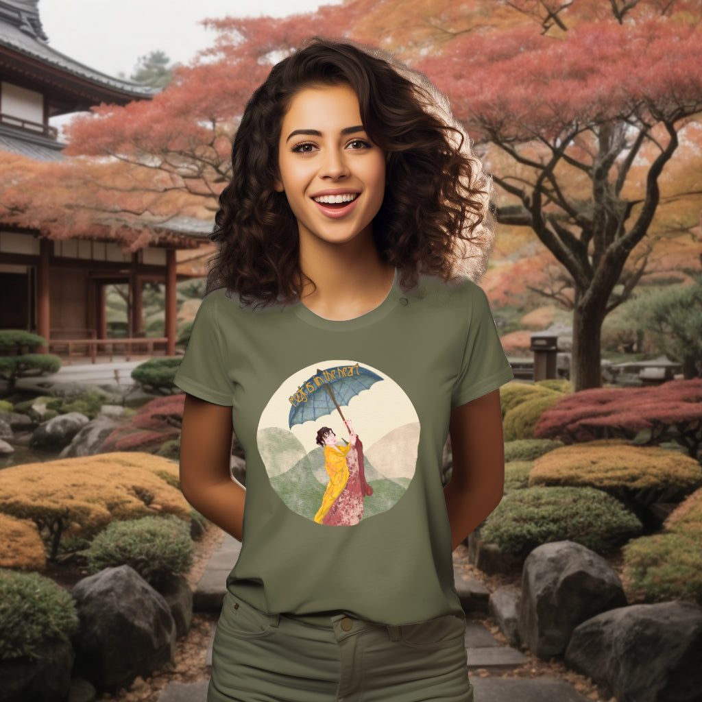 The 'Magic is in the Heart' organic cotton tee in Khaki, modeled to showcase the graceful kimono-clad woman and idyllic washi-inspired scenery, celebrating a journey of self-discovery and cultural homage.