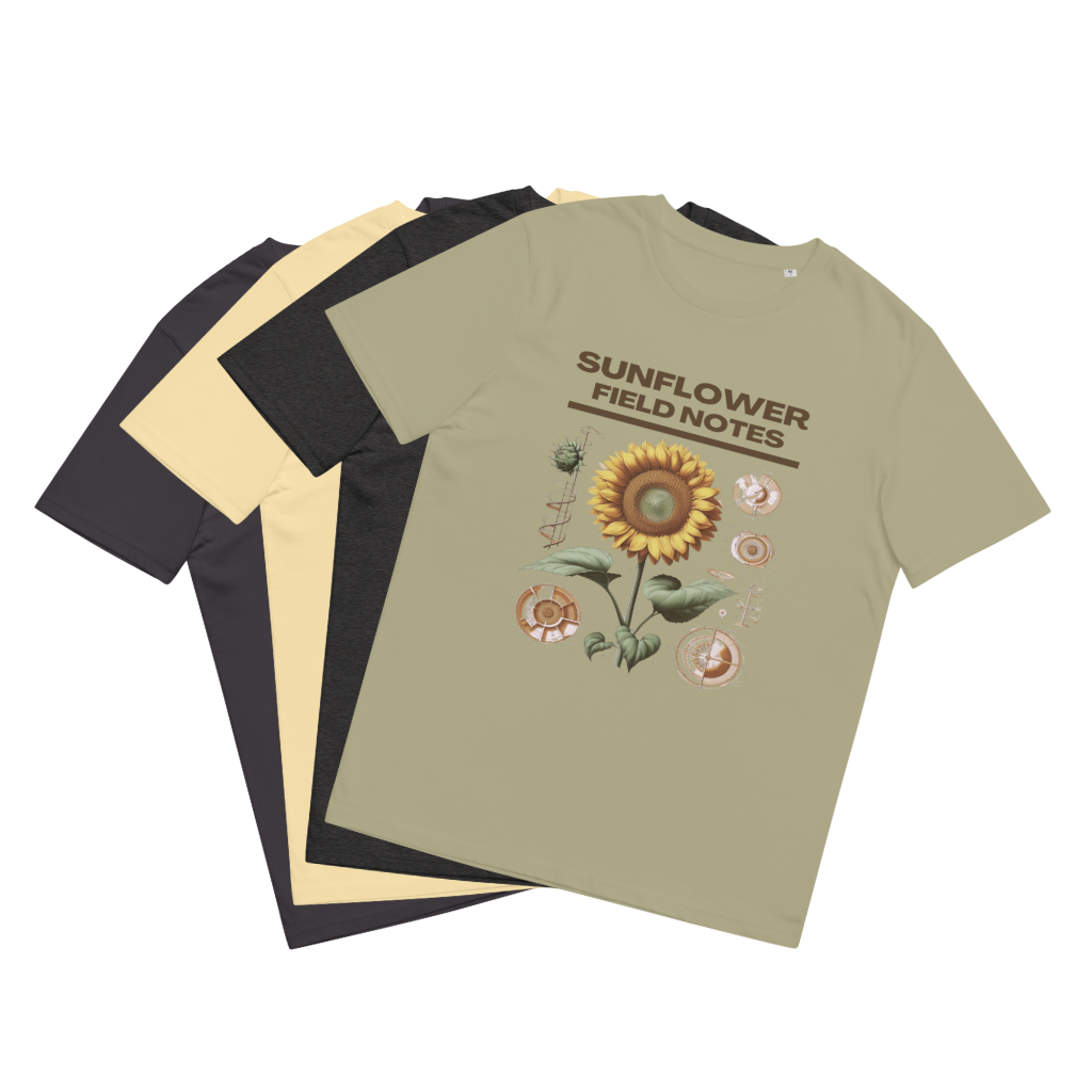 A showcase of 'Sunflower Field Notes' Tee Shirts in all offered colors, artistically fanned out in a lay-flat display, highlighting the uniform beauty of the sunflower illustrations across various hues, celebrating the fusion of natural art and sustainability.