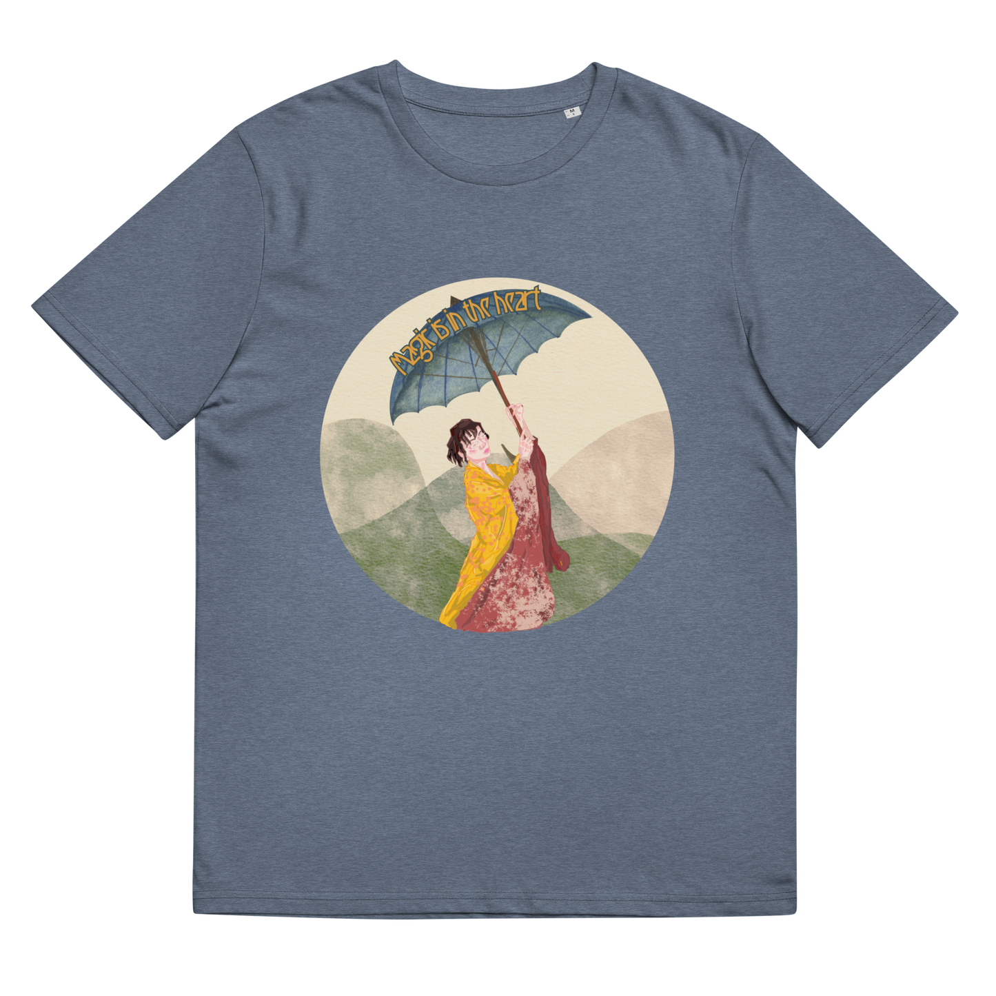 Lay-flat image of the 'Magic is in the Heart' T-Shirt in Dark Heather Blue, showcasing the watercolor artwork of a young woman in traditional Japanese attire, set against a delicate and imaginative countryside.