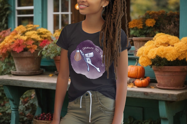 Model wearing the 'Drawn to the Light' T-Shirt in Anthracite, featuring a watercolor Luna Moth design with the inspirational phrase, perfect for those who value both style and substance.