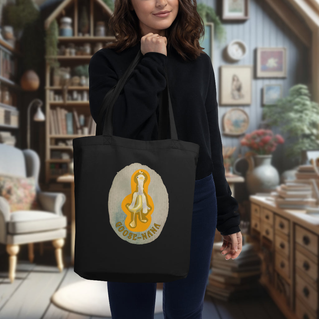 Model carrying the 'Goose-nana' Tote in black, accentuating the humorous Goose-Nana watercolor design, a perfect blend of functionality and whimsy for the playful at heart.