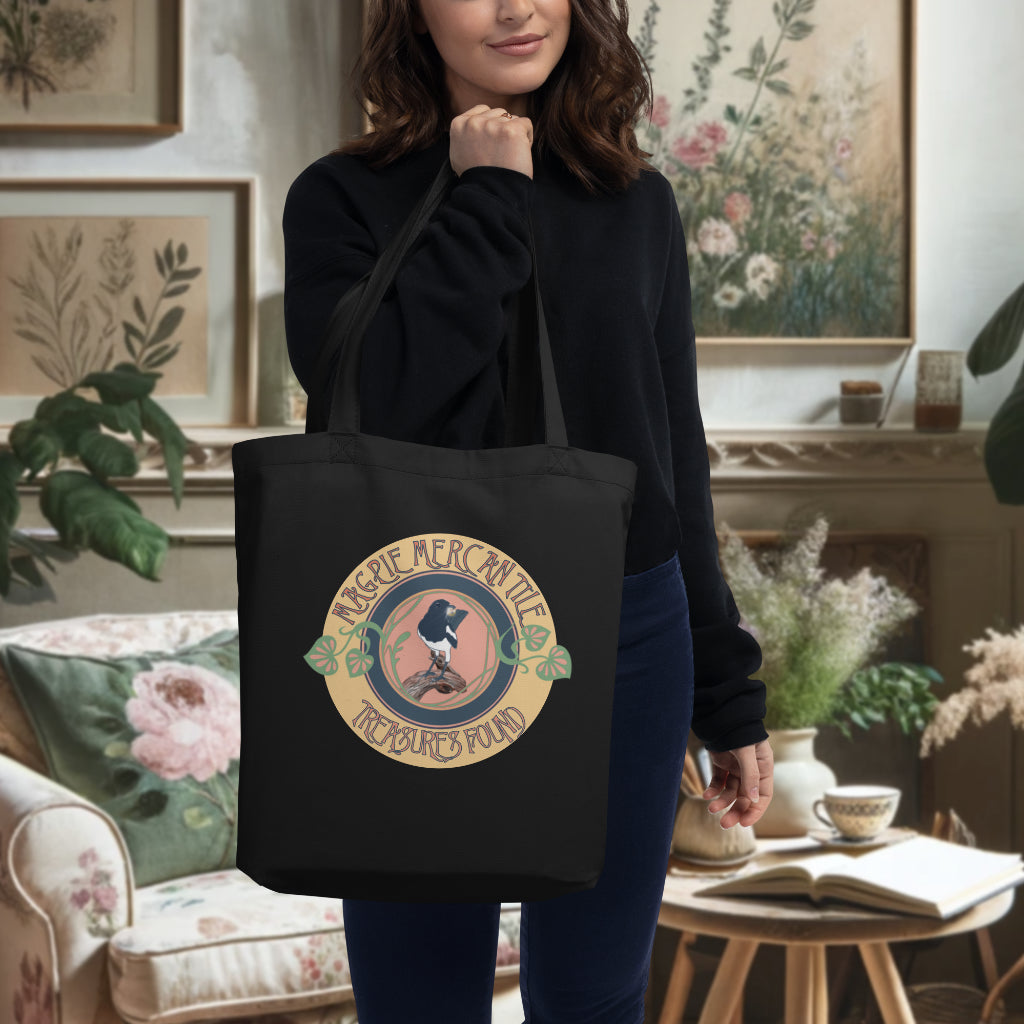 Model carrying the 'Magpie Mercantile Logo' Tote in black, accentuating the magpie logo design, a perfect blend of functionality and artistic expression for the eco-conscious and style-savvy.