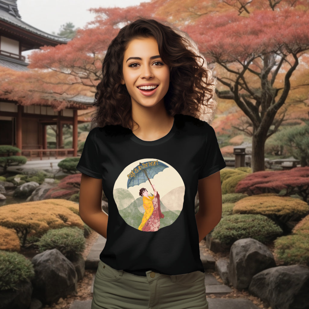 The 'Magic is in the Heart' organic cotton tee in Black, modeled to accentuate the graceful kimono-clad woman and scenic washi paper-inspired background, celebrating cultural beauty and self-empowerment.