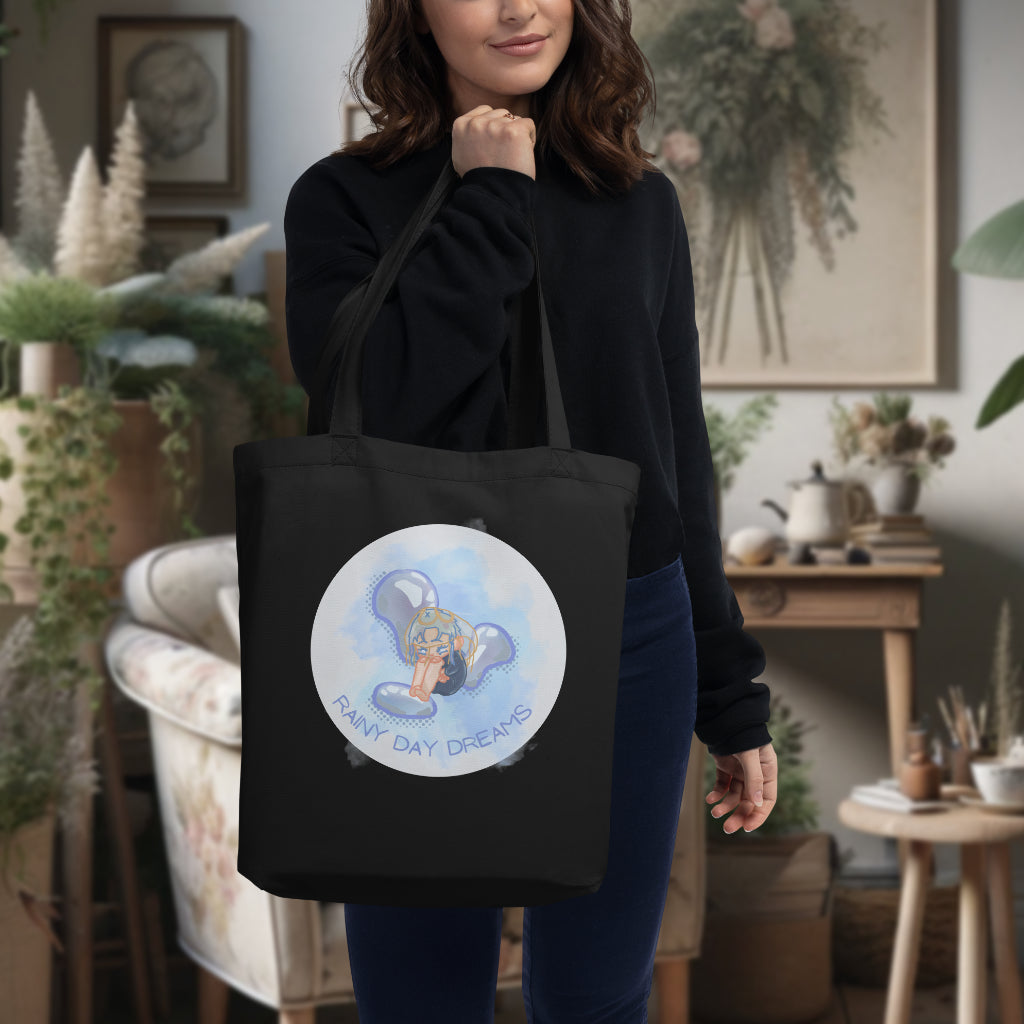 Model carrying the 'Rainy Day Dreams' Tote in black, accentuating the evocative Chibi character design, a perfect blend of functionality and emotional expression for those who embrace their dreams and feelings.