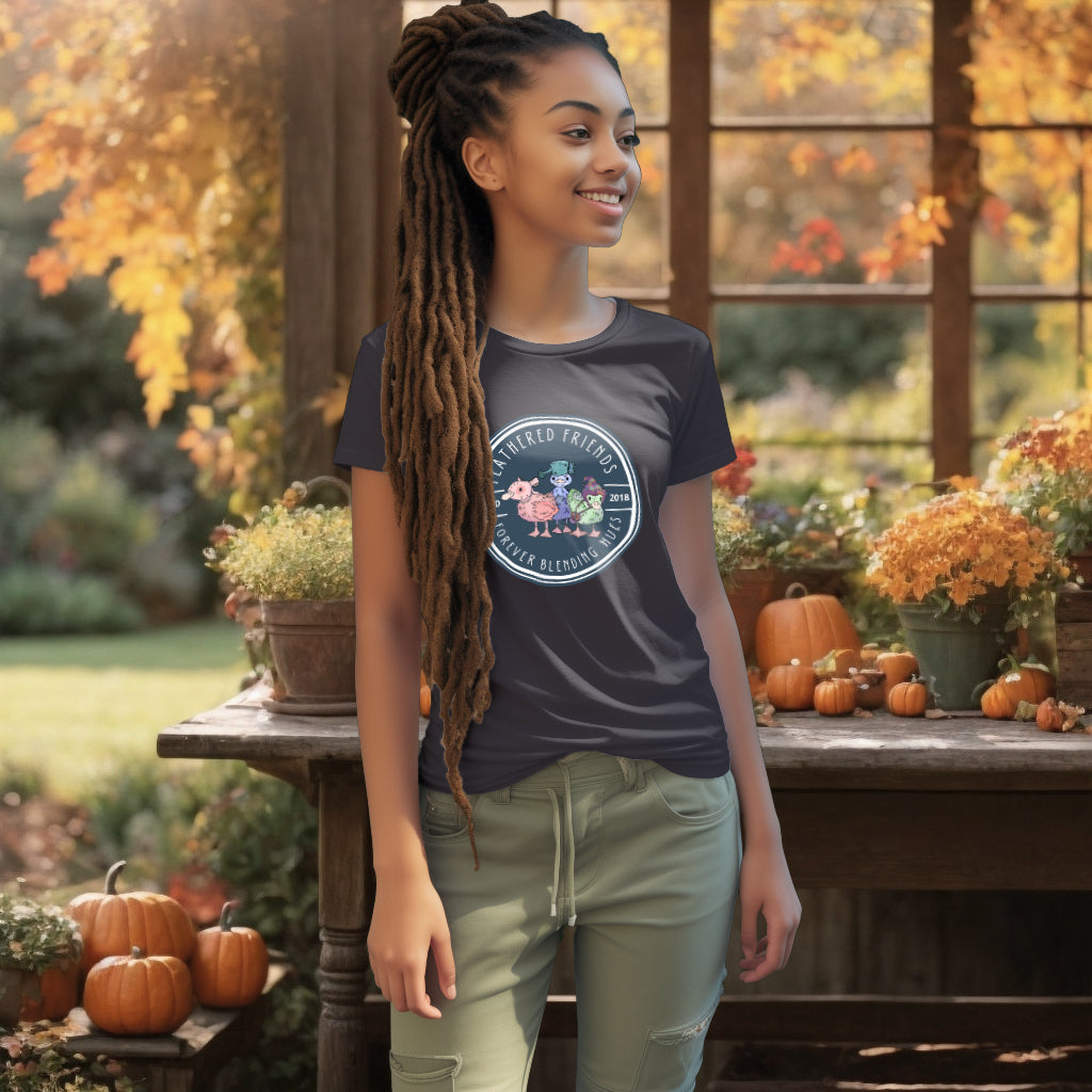 The 'Feathered Friends' T-Shirt in a deep Anthracite hue on a model, featuring a pearl-necklaced duckling and companions, illustrates the vibrant diversity of friendships.