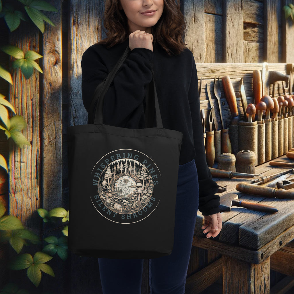 Model carrying the black 'Whispering Pines, Silent Shrooms' Tote Bag, elegantly portraying the forest's symbiosis between mushrooms and pines, a statement of sustainability and natural beauty.