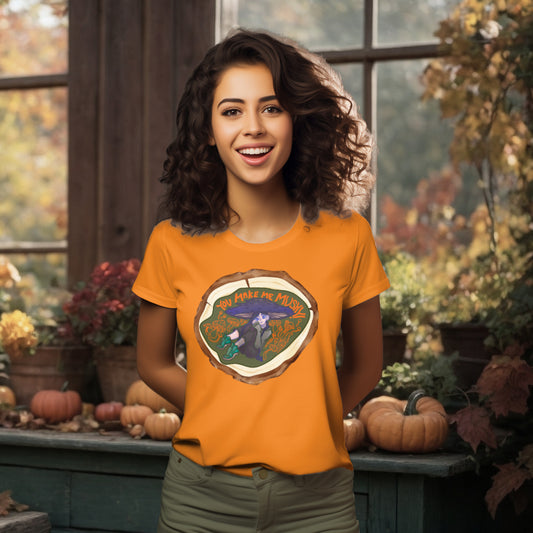 Model wearing the 'You Make Me Mushy' T-Shirt in Day Fall orange, featuring a charming mushroom girl and an assortment of mushrooms, symbolizing nature's whimsy and heartfelt emotions.